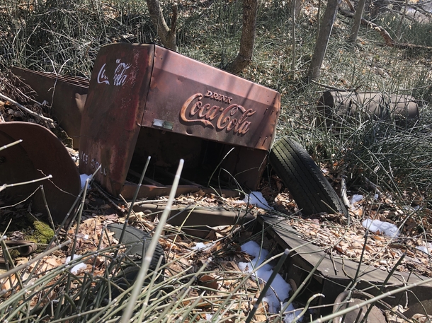 Abandoned Coca-Cola Cooler behind a  year prison