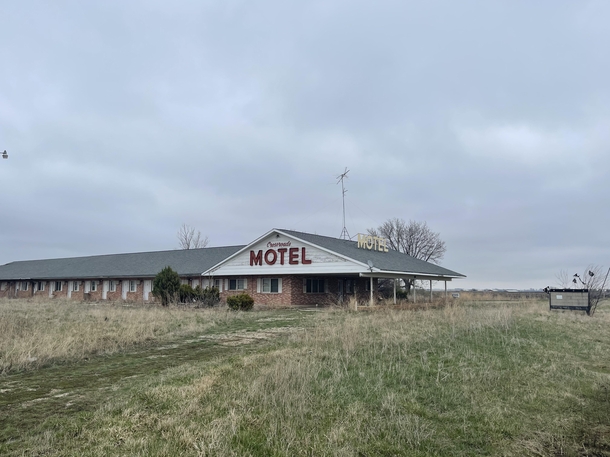 Abandoned Crossroads Motel rural Iowa USA