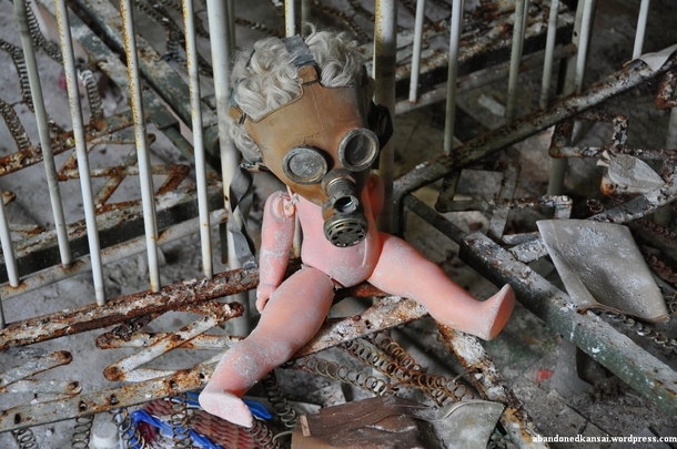 Abandoned doll with a gas mask at a kindergarten in Pripyat  Chernobyl  More in the comments