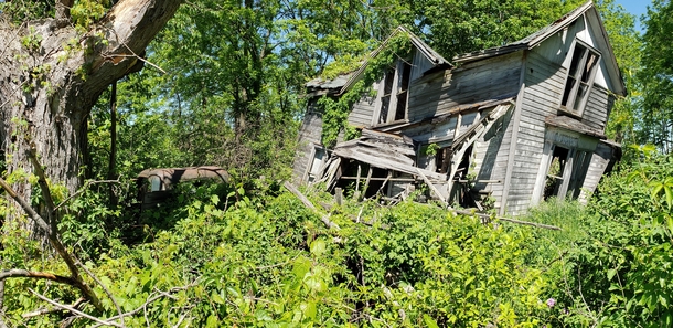 Abandoned farmhouse and car Finger Lakes NY 