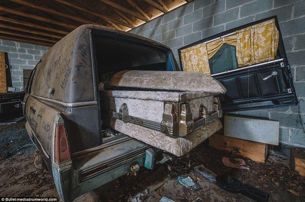 Abandoned hearse amp casket in an abandoned funeral home in Alabama