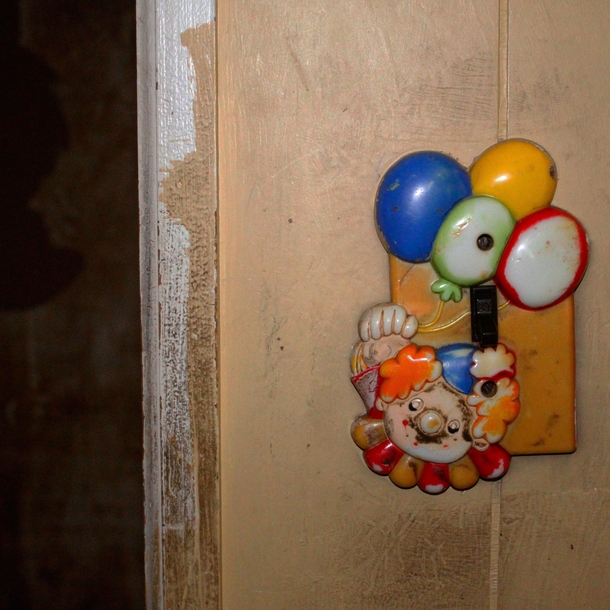 Abandoned home built in  Creepy clown has kept watch over the place