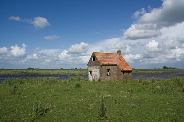 Abandoned house on the Dutch river island Tiengemeten 