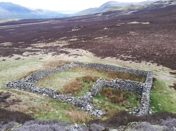 Abandoned livestock pen at the foot of Bleaberry Fell near Keswick in the Lake District