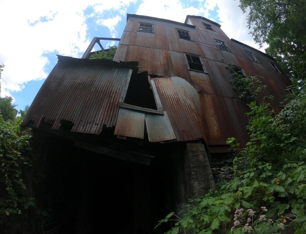 Abandoned paper mill in Ellenville NY There is a water fall which a lot of people go swimming in but I heard the water has chemicals leaking in from the mill Its getting knocked down soon though