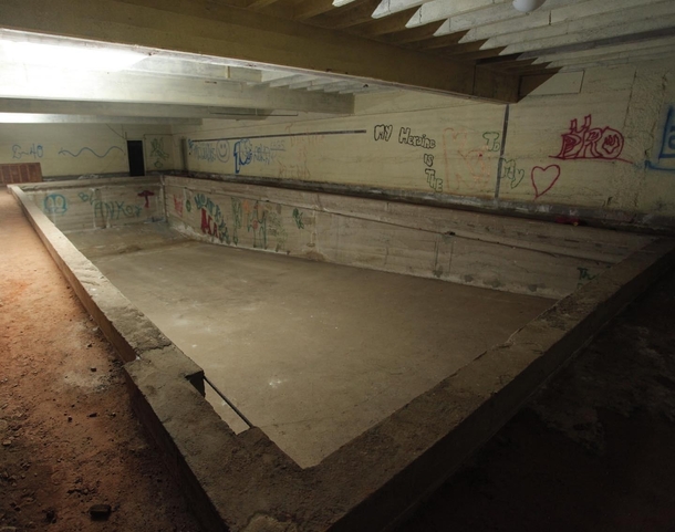 Abandoned pool in the basement of the building I work in Details in comments