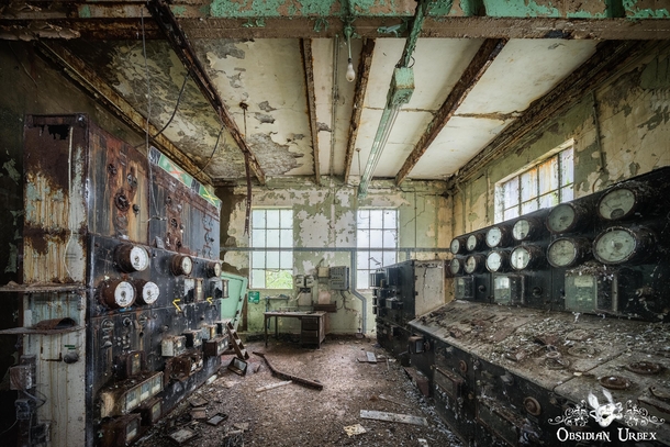 Abandoned power plant control room England 