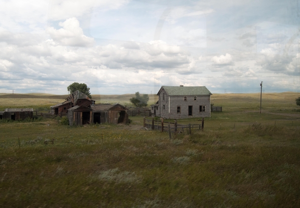 Abandoned prairie farmstead somewhere along the Empire Builder line Montana 
