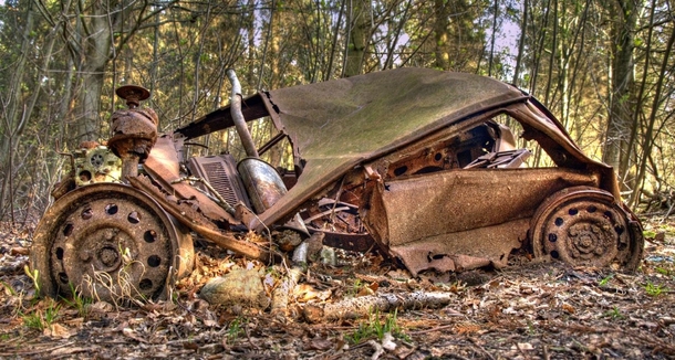 Abandoned rusty car 