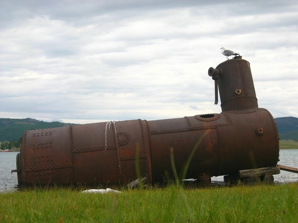 Abandoned steam boiler on the shore of Lake Khvsgl Mongloia 
