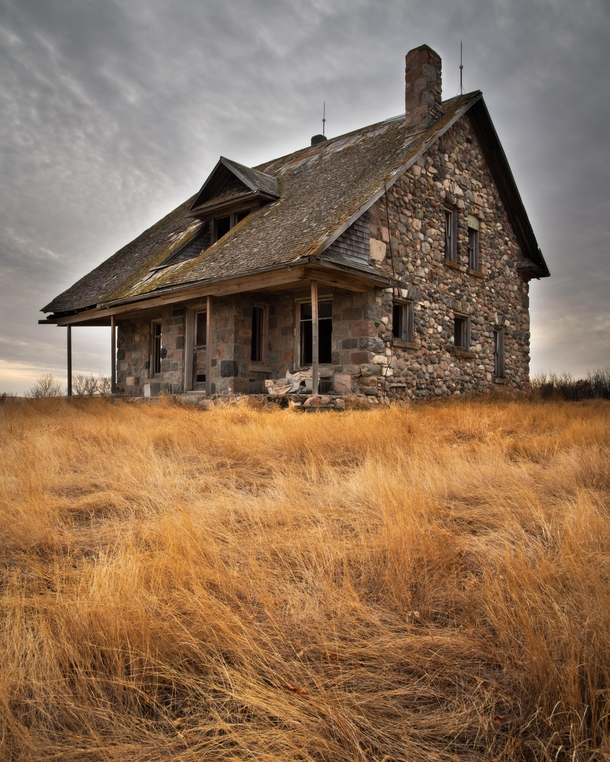 Abandoned stone house made in the early s found on the prairies OC