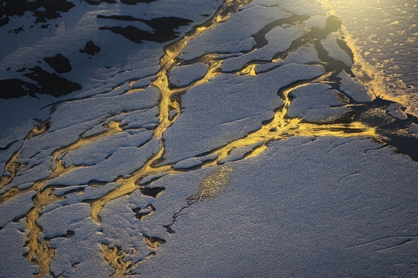Abstract landscapes are becoming my favourite thing to shoot Spring thaw at golden hour in Garibaldi Provincial Park as seen from an airplane  tristantodd