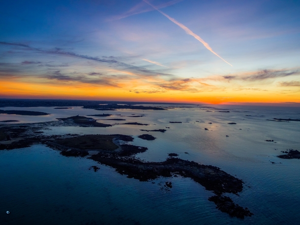 Aerial view of a smoothy after-sunset Brittany coast France 