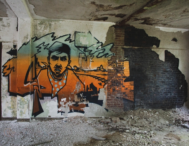 Aging but still vivid graffiti found in an abandoned insane asylum 