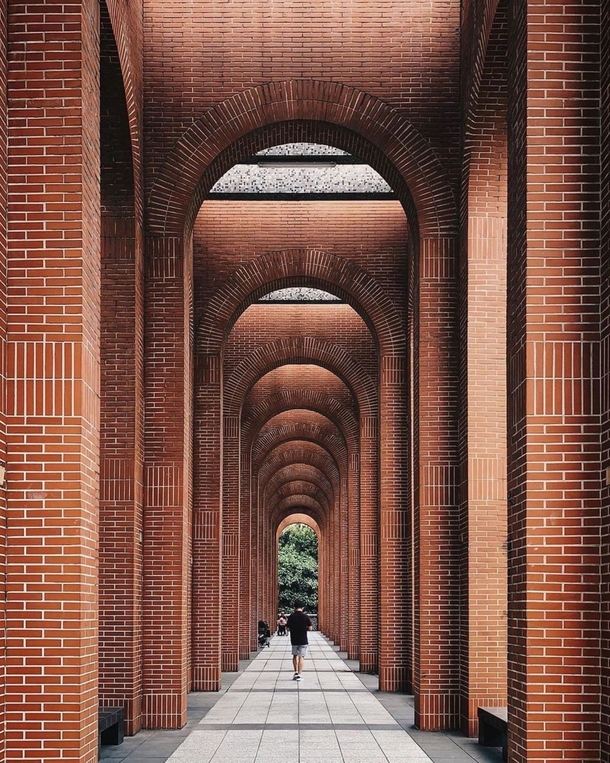 Amazing symmetrical shot from the brick  structures of the TaipeiCity in  Taiwan by hsu_jhihning