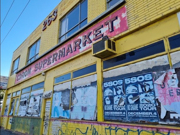An abandoned CDROM Supermarket in Melbourne Victoria Once a port of exciting new technology it sits on a busy road where thousands of people pass it every day obsolete and disregarded