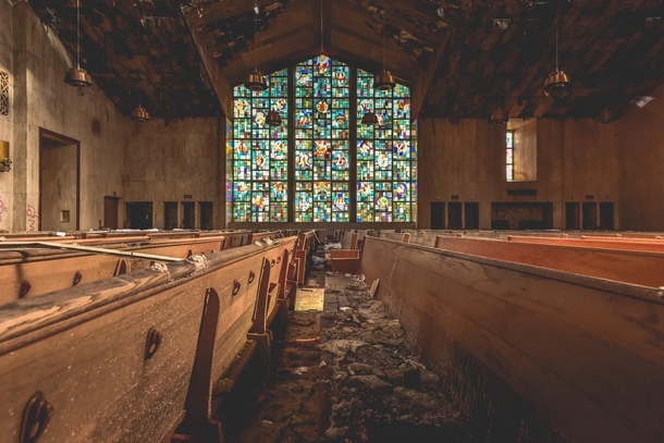 An abandoned church with the stained glass still in tact in Detroit