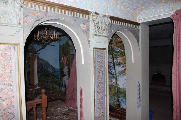 An abandoned mansion covered with odd wall paper