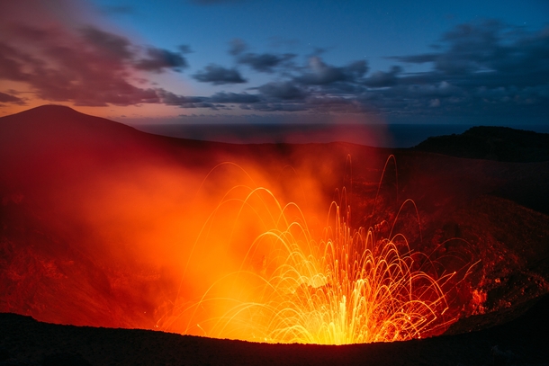 An erupting Mt Yasur Vanuatu at dusk Truly humbling to be so close to such raw power 