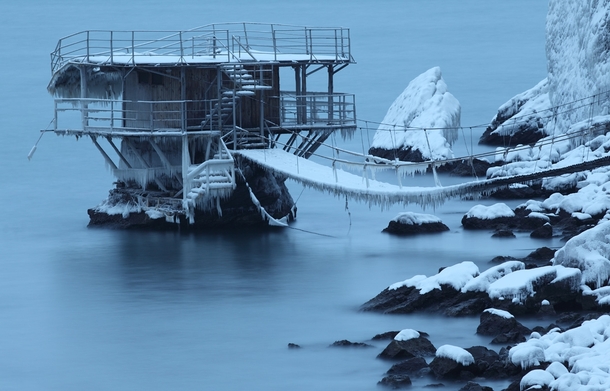 An ice-covered structure built on a rock in the Black Sea off the Crimean coast 