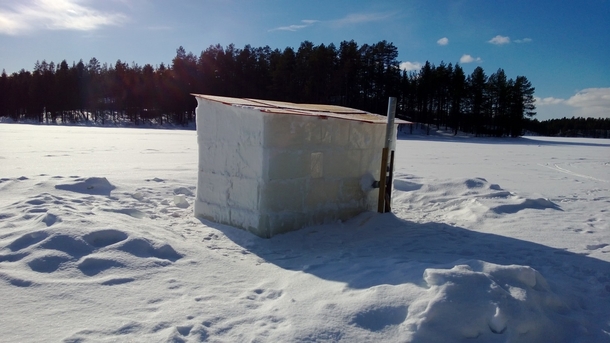 An ice sauna on a lake in Lapland Finland 