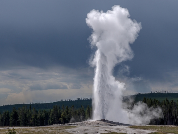 An incoming storm provided the perfect backdrop for Old Faithful Yellowstone National Park 