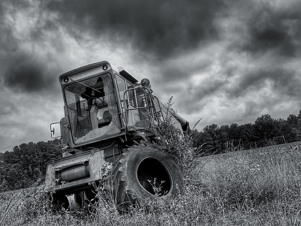 An old harvester at an abandoned farm Central VA