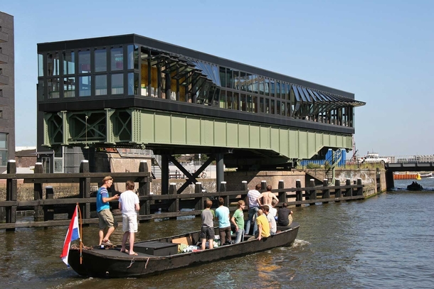 An old railway swing bridge in Amsterdam converted into a restaurant Pay attention to how the windows open 