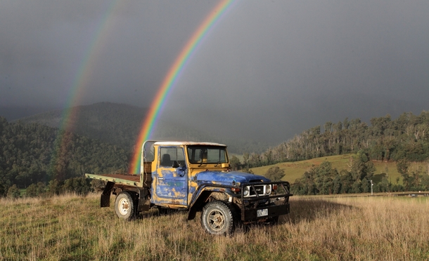 An old Toyota at the end of a rainbow  by Donovan Wilson