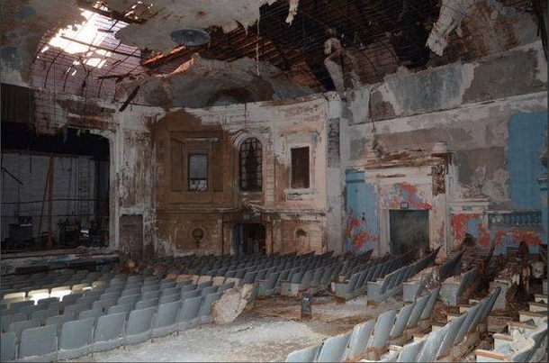 An old vaudeville theater that was at the end of my street growing up It failed showing foreign films porn Rocky Horror second run movies and then was left empty Hurricane Sandy took off the roof and opened it up to the elements There were failed plans to