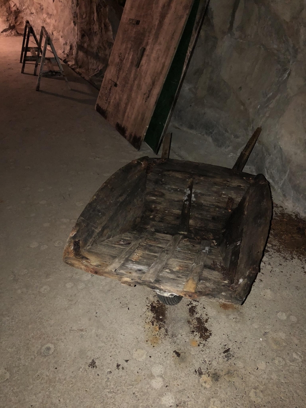 An old wheelbarrow inside the catacombs from WW at the island of Frya Norway