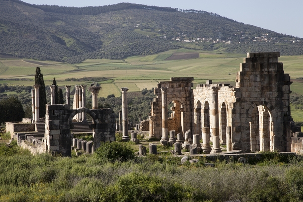 Ancient and modern The Roman ruins of Volubilis sit in a field next to a village near the Moroccan city of Meknes 