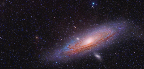 Andromeda and its Third  sattelite galaxy top left