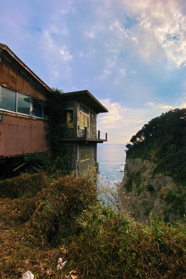 Another angle of this forgotten cliffside Japanese home 