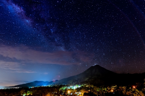 Another Costa Rica night sky includes volcano 