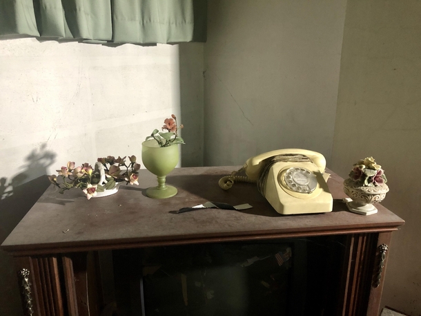 Another snap from inside an abandoned house I explored this week Love these old dial phones Link in comments if you want to see more