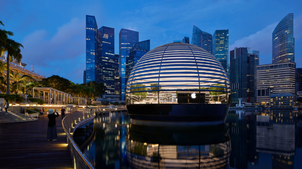 Apple Marina Bay Sands s the first Apple Store to sit directly on the water appearing as a sphere floating on the iridescent Marina Bay Singapore