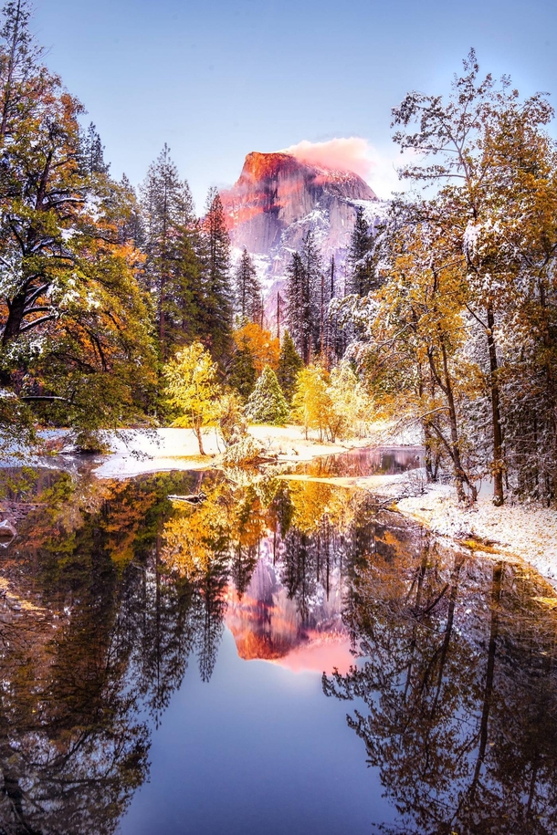 Are we still doing Yosemite I got lucky to see some bright fall foliage under a blanket of fresh white snow with a little alpenglow on Half Dome high above Single exposure shot -  - IG BersonPhotos