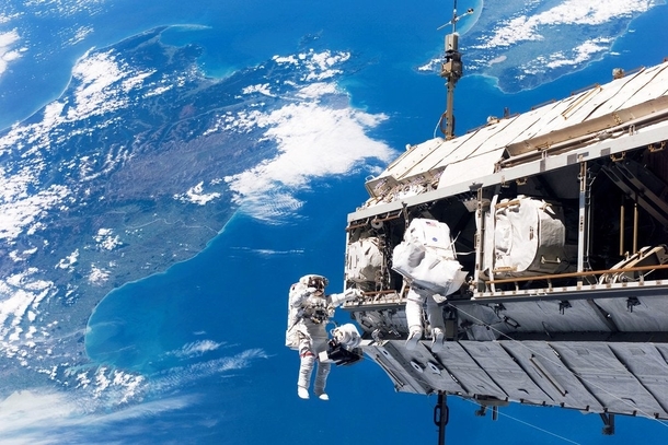 Astronauts wBalls of Steel Working on the International Space Station