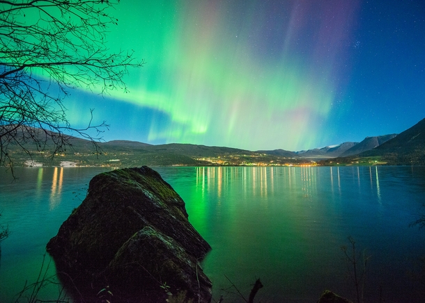 Aurora and stars above Reed in Nordfjord Norway 