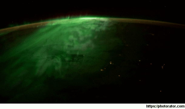 Aurora illuminating the land below