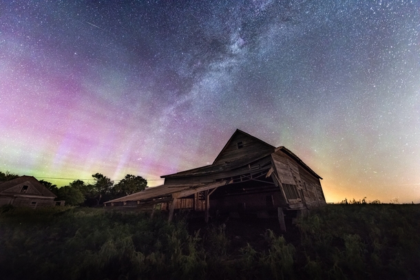 Aurora over an abandoned Nebraska farmstead 