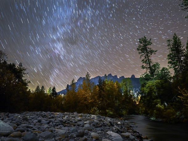 Autumn Leaves Star Trails and the Milky Way over the Castle Crags in Northern California 