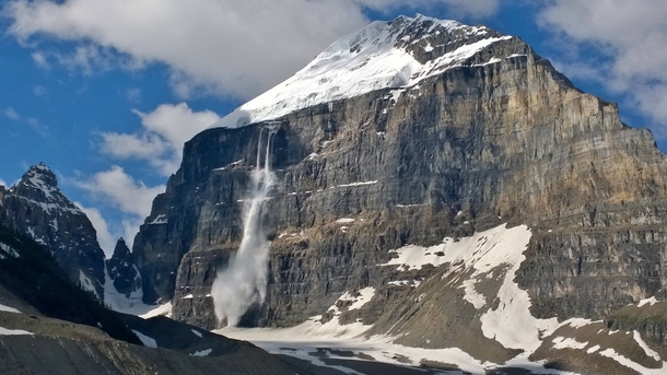 Avalanche seen above the plain of  glaciers trail Lake Louise Canada 