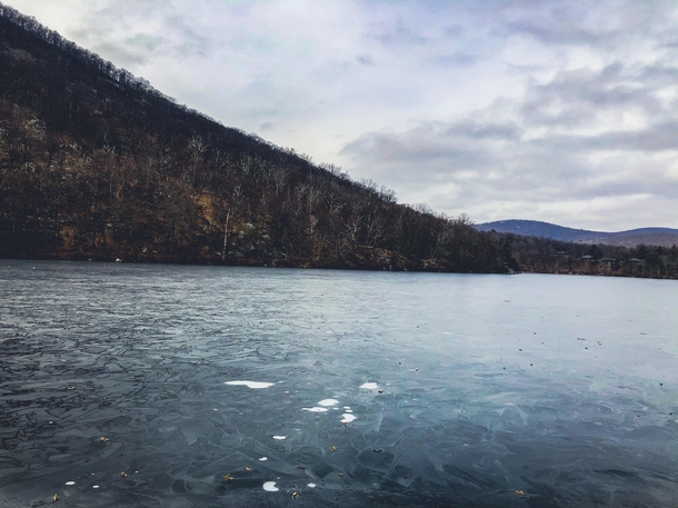 Bear Mountain barely iced over lake  x  
