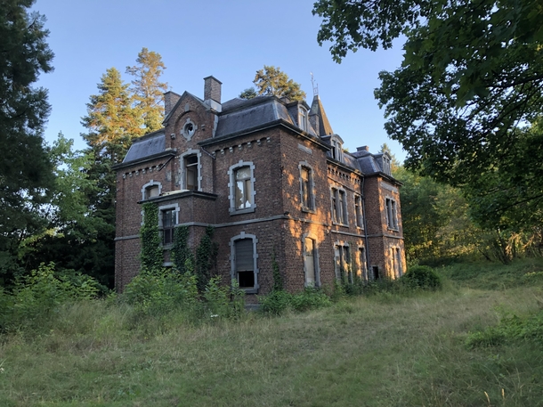 Beautiful abandoned chateau with the sunset Rochefort Belgium 