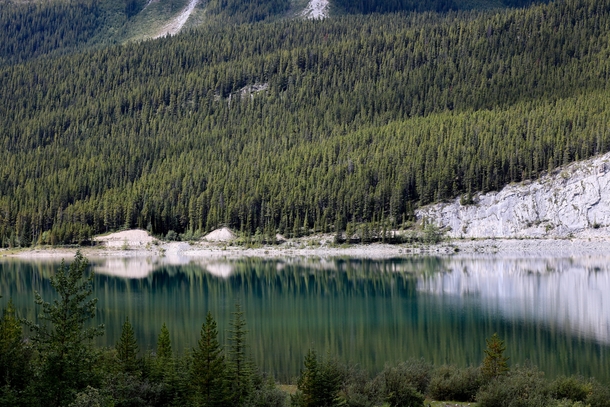 Beautiful reflective lake in Glacier National Park BC 