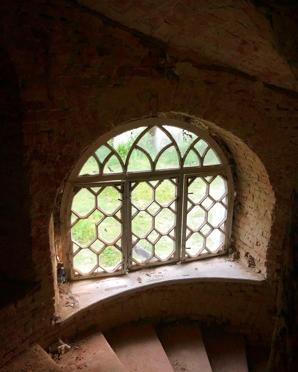 Beautiful window of an abandoned castle