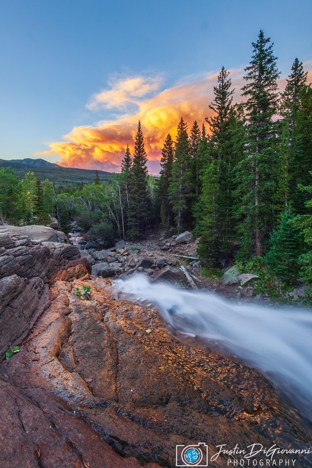 Beauty Among The Chaos  Colorado fires still burning strong captured from RMNP at the top of Alberta Falls