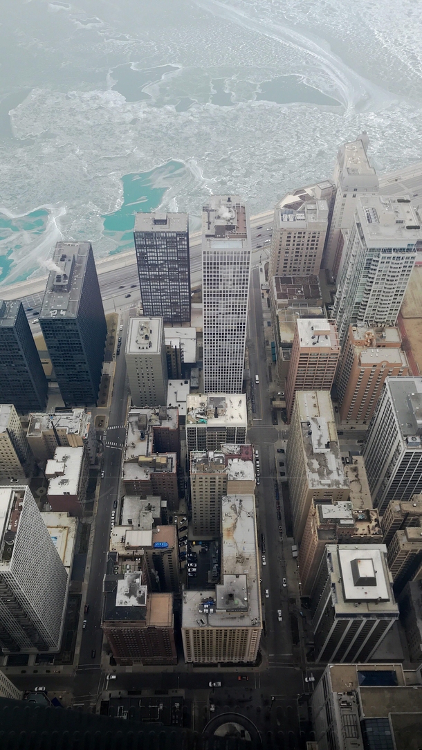 Birds Eye View of Chicago and a Frozen Lake Michigan Image 